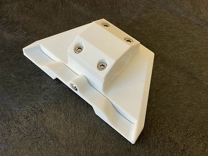 White plastic part with screws
