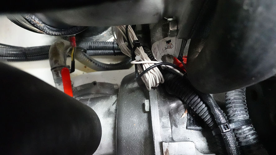 Close-up of engine wiring and components