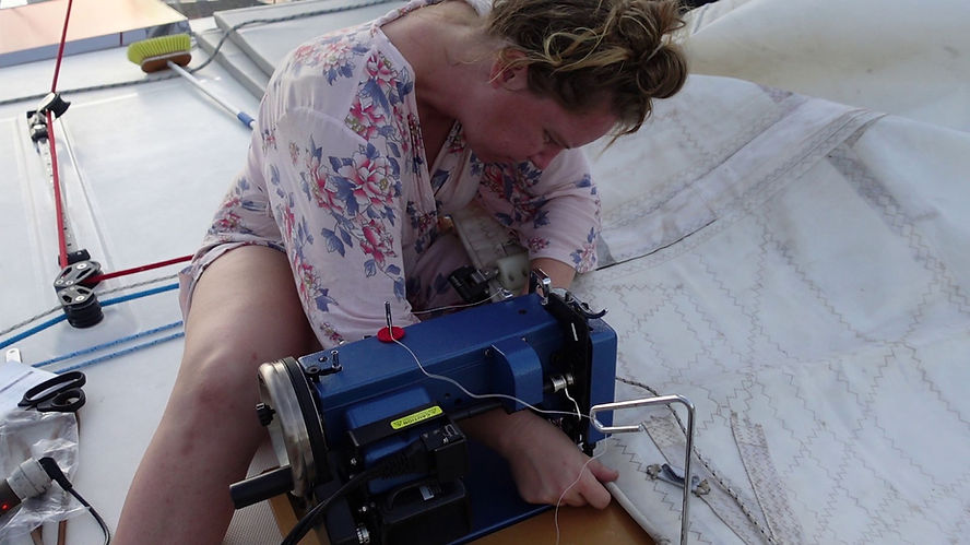 Fixing a sailboat main sail with a Sailrite Ultrafeed